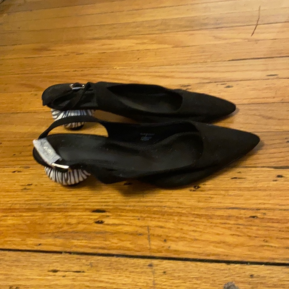 Brand new mules with zebra heel